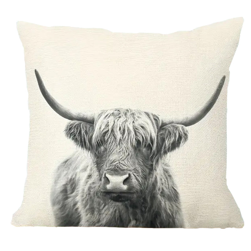 Square linen pillow cover featuring a centered, front-facing Highland cow portrait with extended horns on a neutral background.