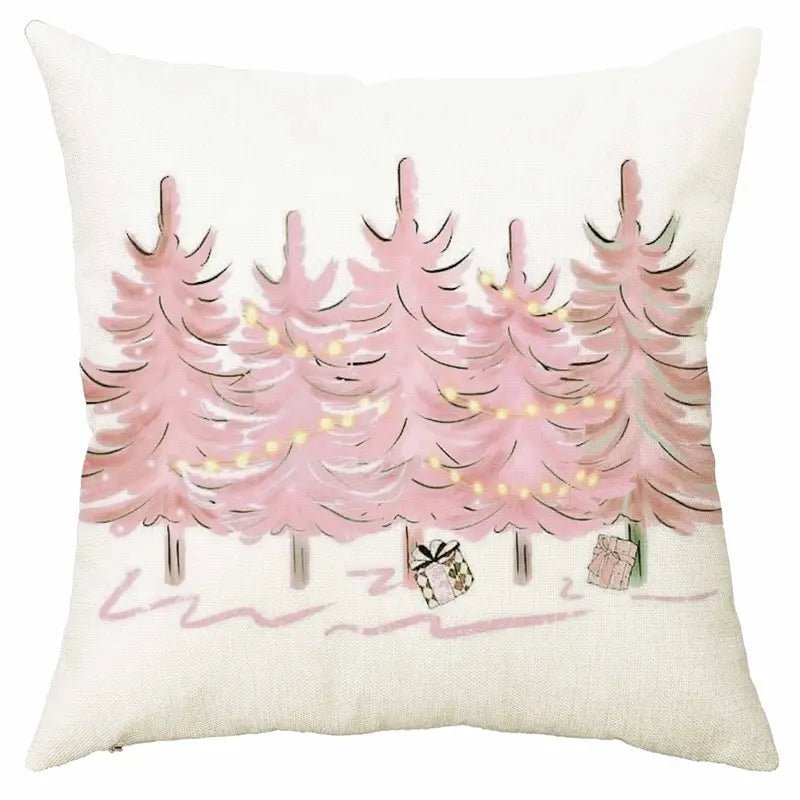 Pink Christmas trees pillow cover with string lights and wrapped presents in a watercolor holiday design