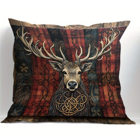 Deer pillow cover with stag illustration and bold Celtic knot detailing across the chest on a red plaid background.
