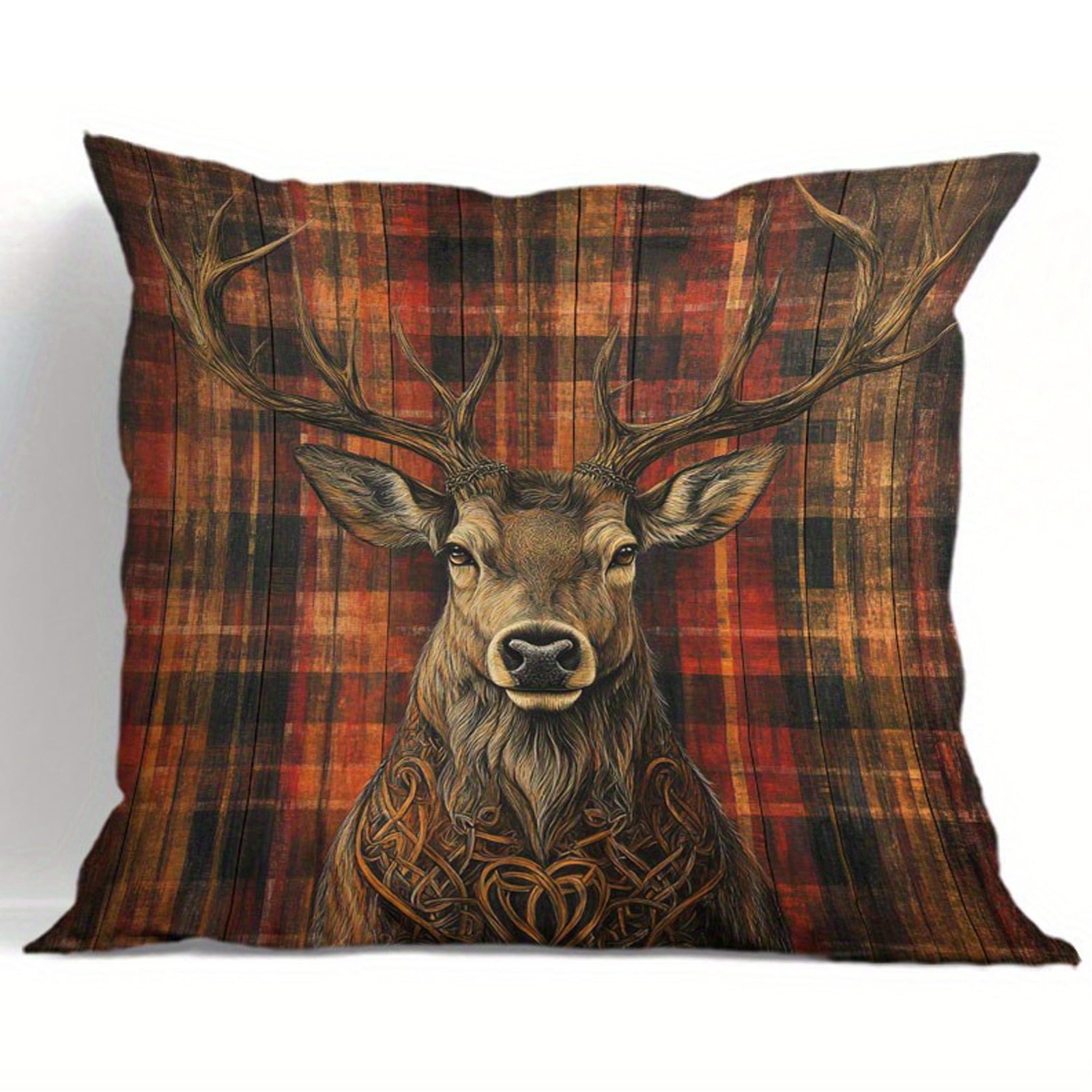 Deer pillow cover with centered stag illustration and minimal knot detailing on a red and green plaid background.