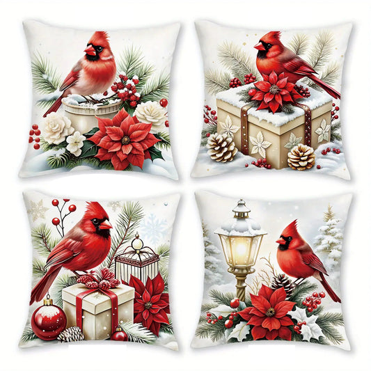 Red cardinal Christmas pillow cover collection featuring cardinals, poinsettias, gifts, lantern and winter greenery designs.