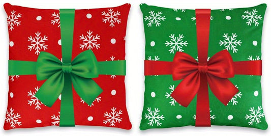 Red and green pillow covers with snowflake pattern and ribbon bow gift wrap design