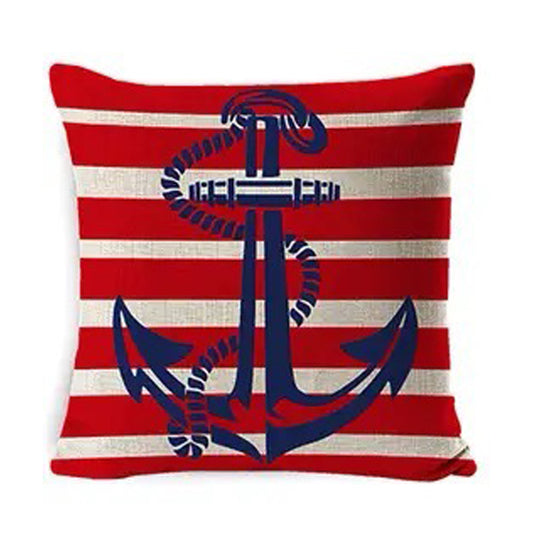 Linen pillow cover featuring a centered anchor over red and navy vertical stripes with nautical-themed script accents.