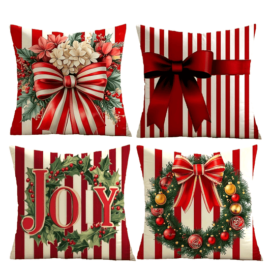 Set of four pillow covers with red and white stripes featuring bow, floral, Joy text, and wreath designs