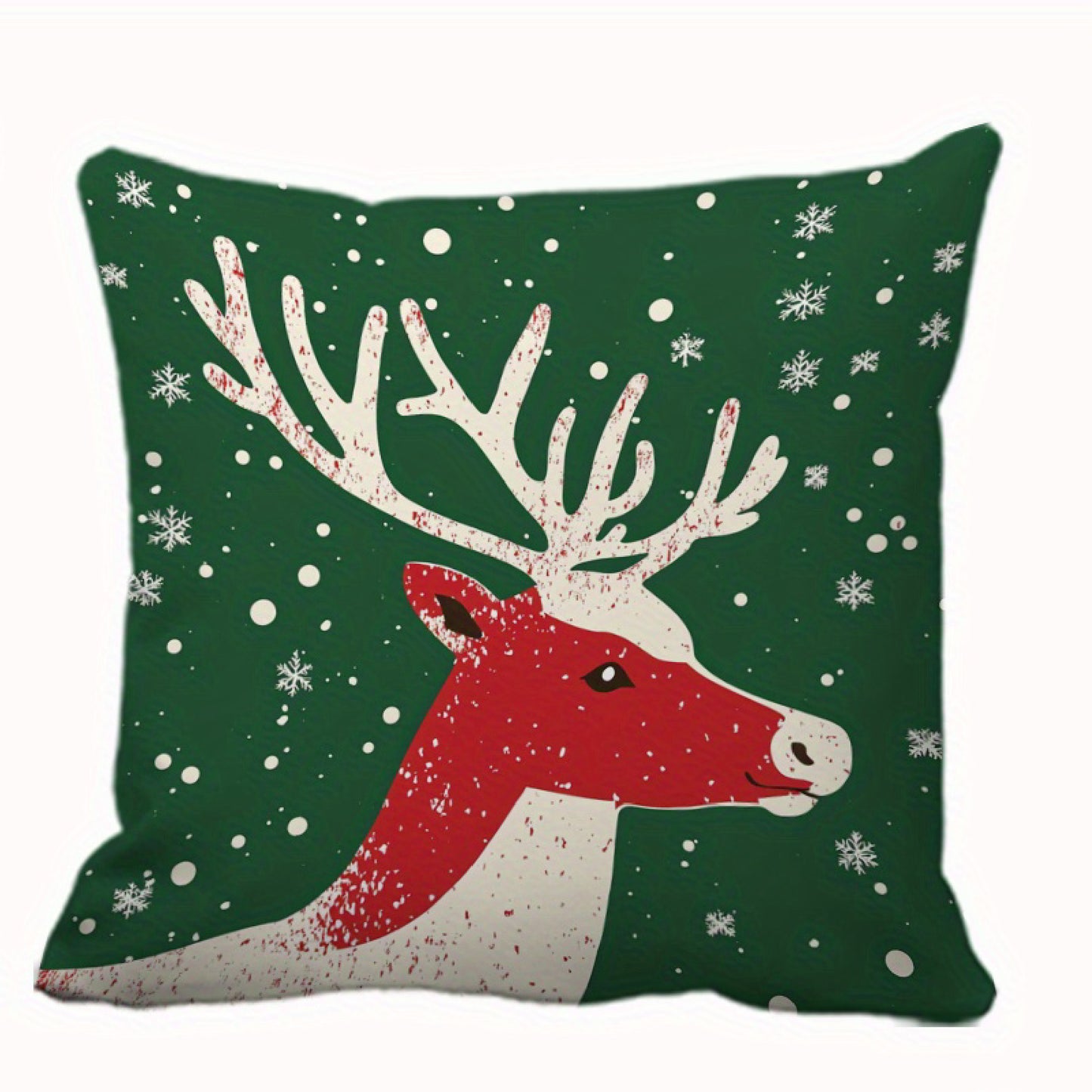 Pillow cover with a reindeer head on a green snowy background