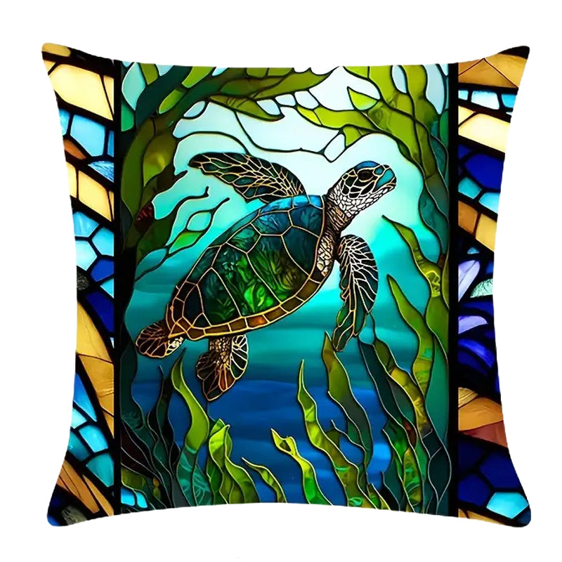 Square 18x18 pillow cover featuring a centered sea turtle surrounded by blue and green ocean tones with stained-glass-style framing details.
