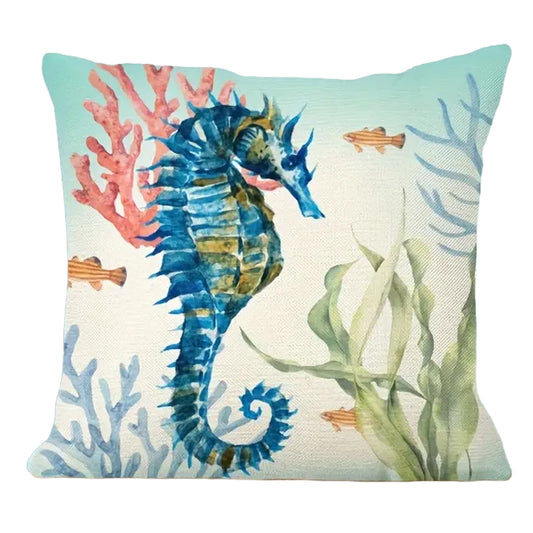 18"x18" linen pillow cover featuring a watercolor seahorse surrounded by coral and sea plants in soft ocean tones.