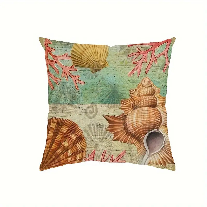 Square pillow cover featuring layered seashells and coral branches on a weathered aqua and sand background.