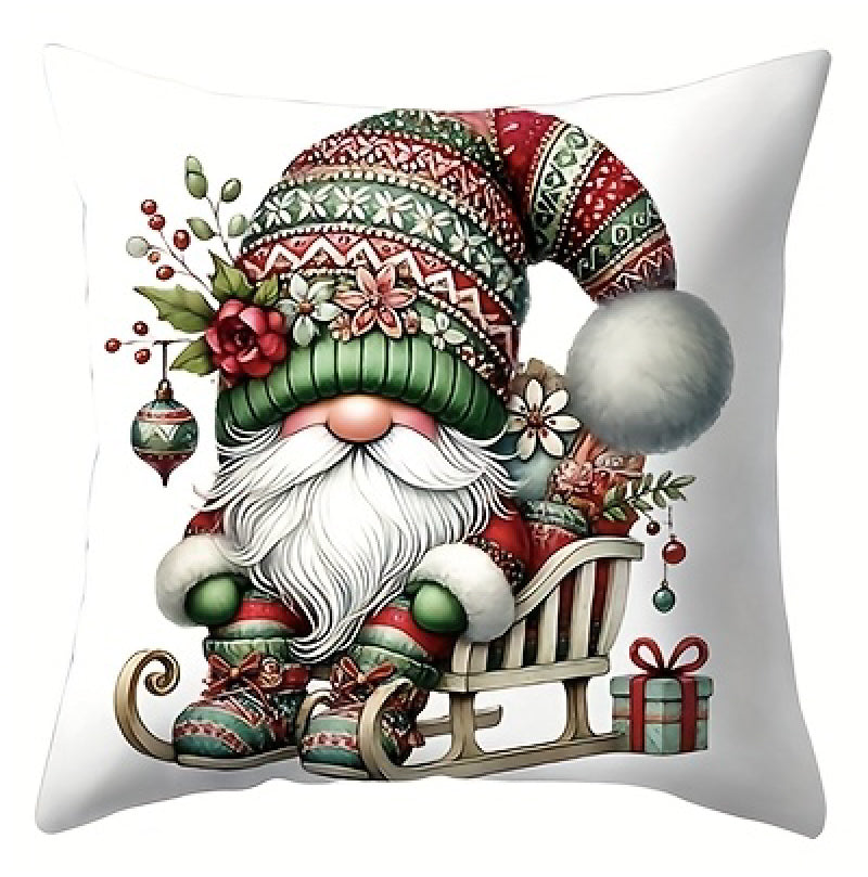 Pillow cover with a gnome sitting on a sled with wrapped gifts and greenery