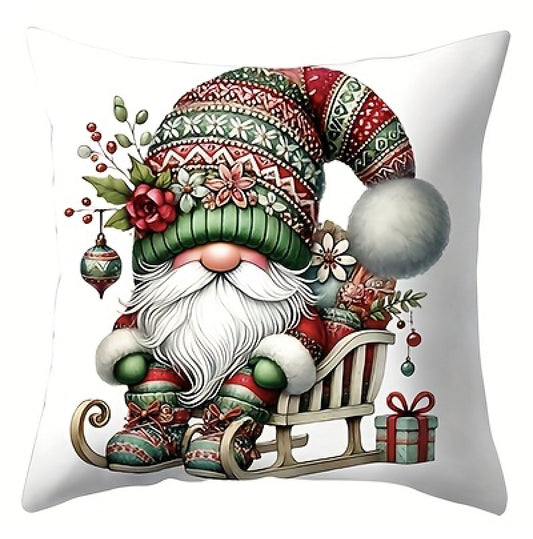 Pillow cover with a gnome sitting on a sled with wrapped gifts and greenery