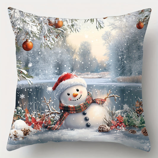 Pillow cover with a snowman wearing a red hat and scarf in a snowy winter landscape