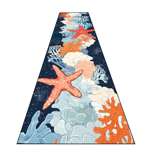 Coastal runner mat featuring starfish and coral reef patterns in navy blue, aqua, and coral tones.