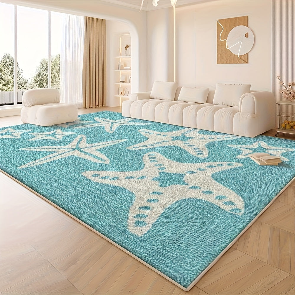 Coastal area rug featuring large turquoise starfish on a light ocean-inspired background.
