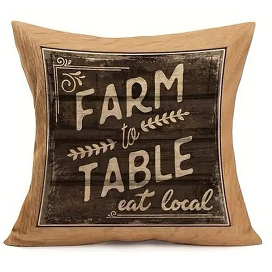 Linen pillow cover featuring a vintage-style Farm to Table sign with “eat local” text and a wood-look framed border.