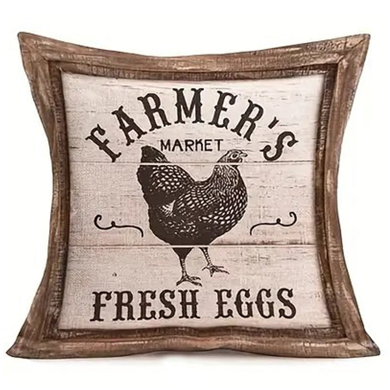 Linen pillow cover featuring a vintage Farmer’s Market Fresh Eggs sign with chicken illustration and wood-look framed border.