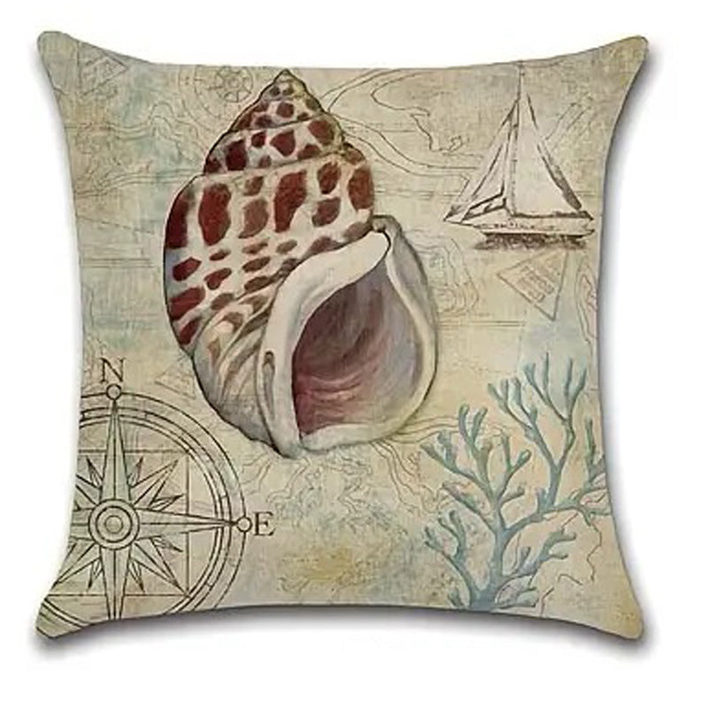 Linen pillow cover featuring a conch shell with compass, sailboat, and coral details on a vintage nautical map background.