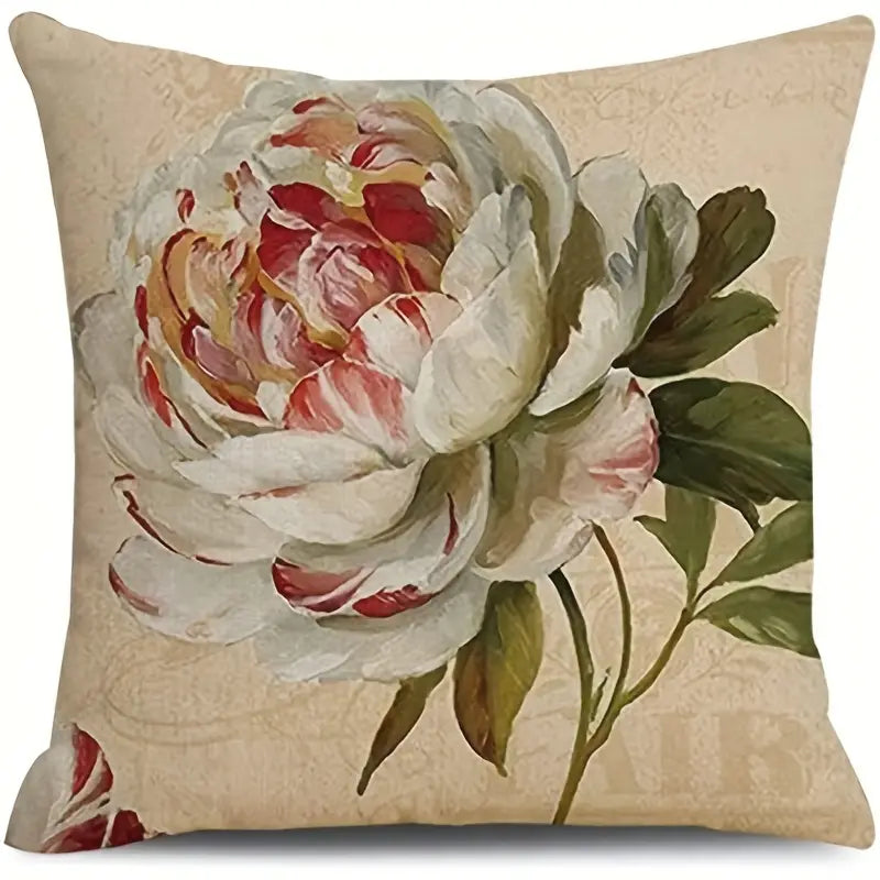 Decorative 18x18 linen pillow cover featuring a large vintage-style peony bloom in cream and muted red tones on a neutral background with green leaves.
