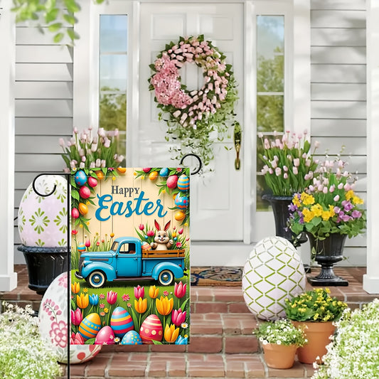 Richly colored Easter garden flag with a rabbit riding in a blue vintage truck surrounded by Easter eggs and spring flowers, displayed outdoors near a garden path for seasonal décor – Coastal Pillows Plus