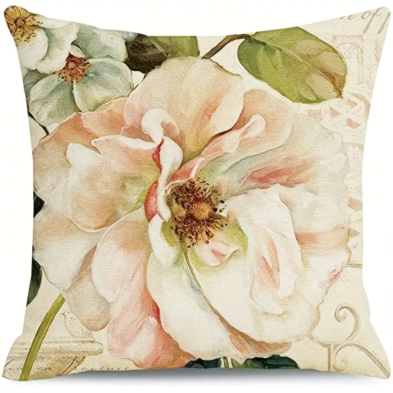 Decorative 18x18 linen pillow cover featuring a large vintage-style wild rose bloom in blush and cream tones on a neutral background with soft green leaves.