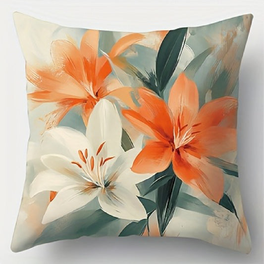 Floral pillow cover featuring diagonally arranged orange and white lilies with soft green leaves in a watercolor-style design, shown on a white background.