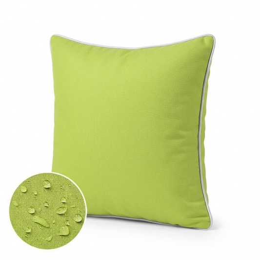 Solid lime green waterproof outdoor pillow cover displayed on a patio chair with a light cushion, shown with water-resistant fabric detail inset.