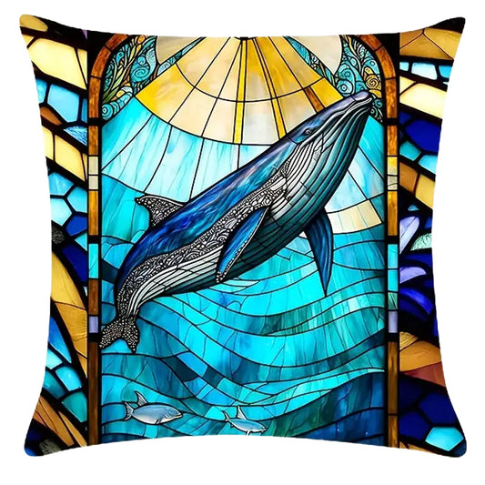 Square pillow cover featuring a large whale swimming above layered ocean waves with a radiant sun and stained-glass-style framing in blue and gold tones.