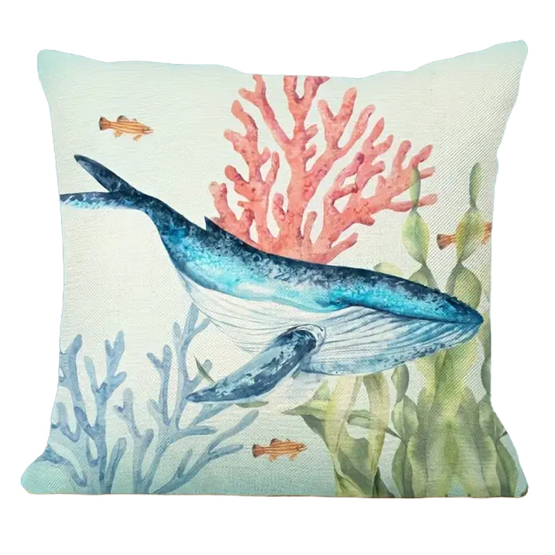 18"x18" linen pillow cover featuring a watercolor whale swimming among coral and sea plants in soft ocean tones.