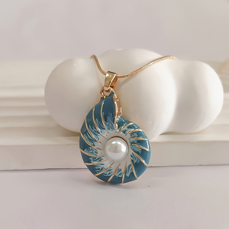 Vintage blue snail pendant necklace featuring a cultured-style pearl for a classic and unique nautical décor look.