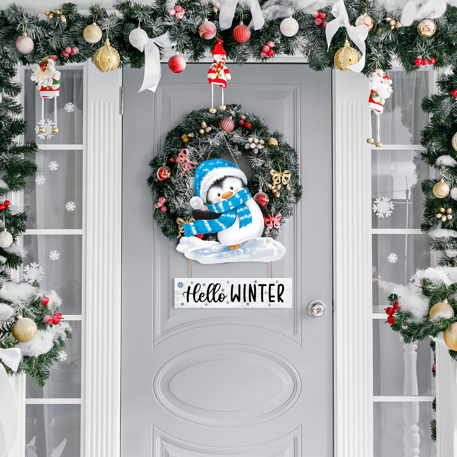 Charming 9.84 x 9.64 inch "Hello Winter" penguin door hanging featuring a snowy blue and white cut-out design for seasonal home décor.